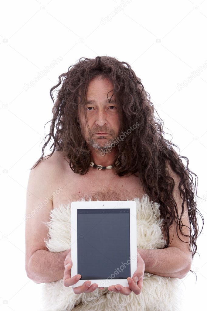Funny primitive man holding a PC tablet