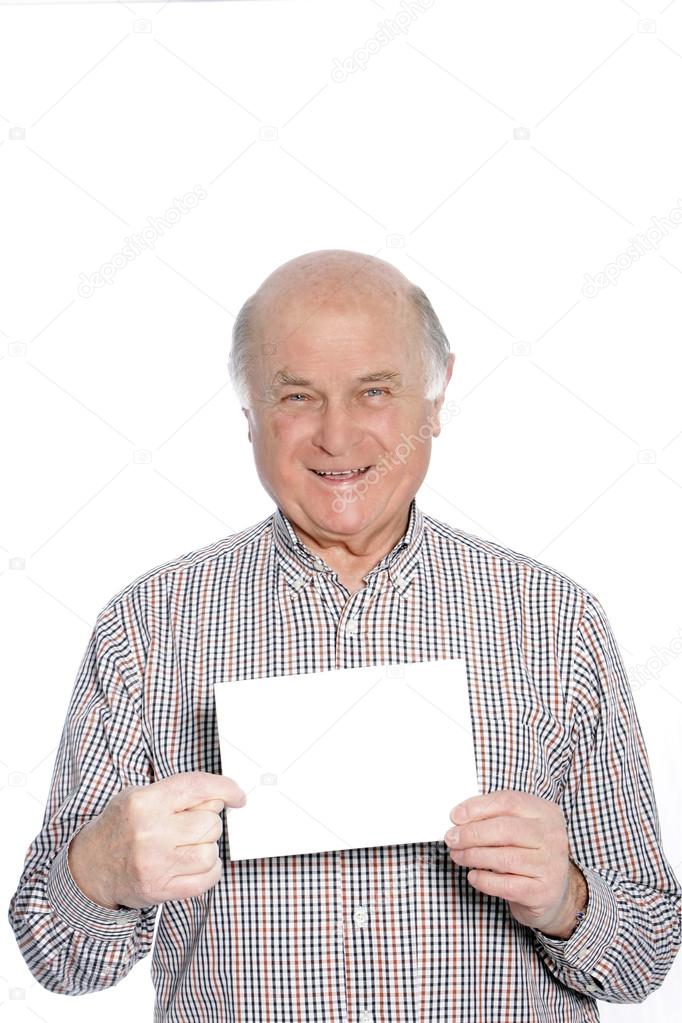 Senior man holding a blank card