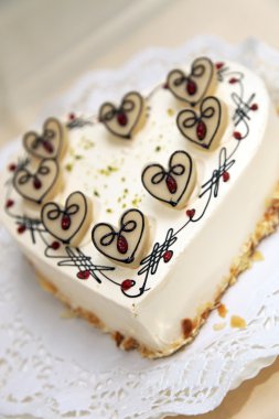 Delicious heart shaped cake clipart