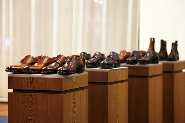 Mens shoes in a store display — Stock Photo, Image