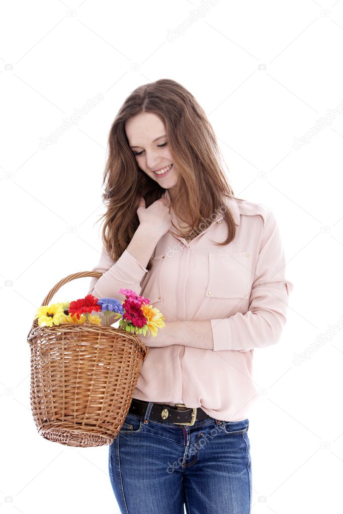 Smiling teenager with a basket of flowers