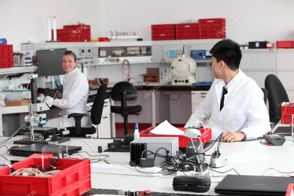Technicians working in a modern laboratory