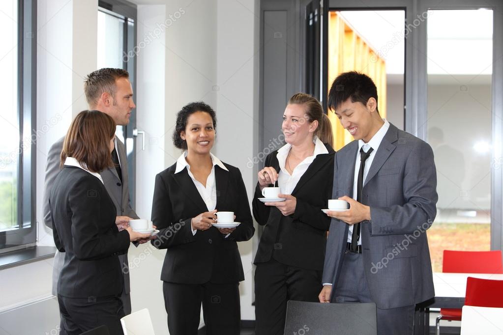Group of diverse businesspeople on coffee break