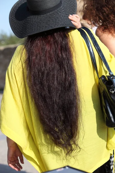 Rear view of a woman with long brunette hair — Stock Photo, Image