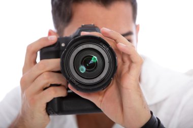 Male photographer taking a photograph clipart