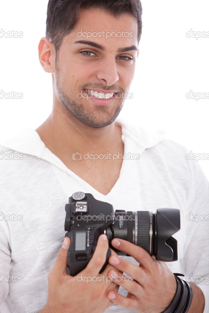 Smiling man with a digital camera