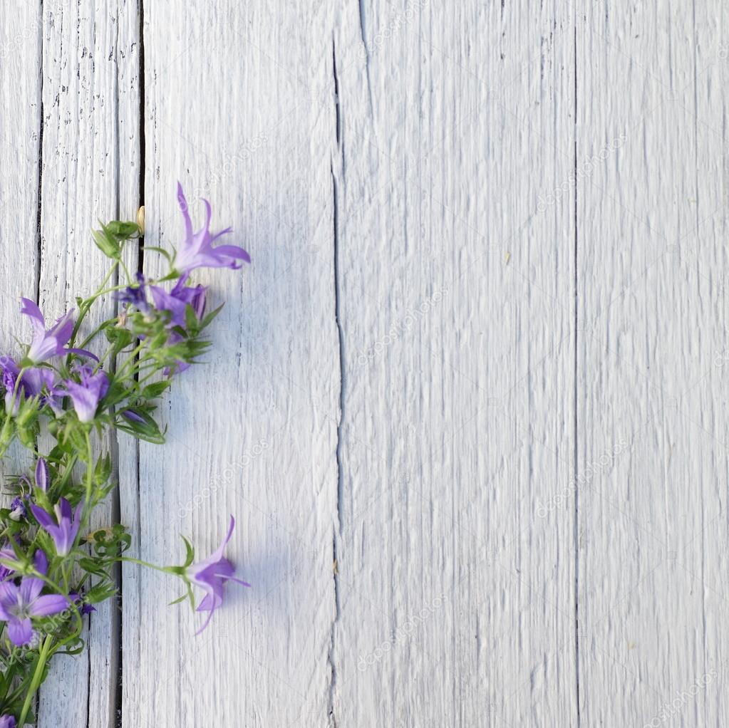 Bunch of purple flowers on white painted wood ⬇ Stock Photo, Image by