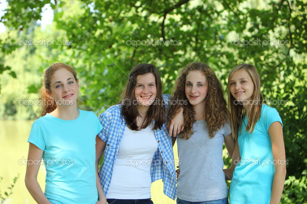 Group 4 happy smiling young teen girls. Fashion lady teenager