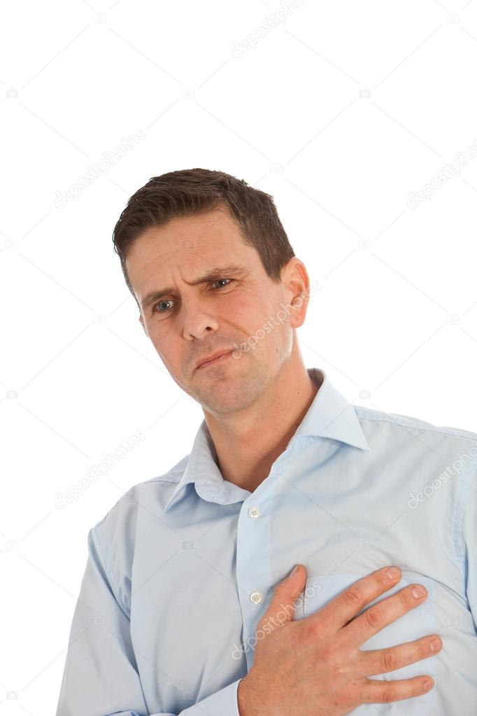 Man clutching his chest with his hand