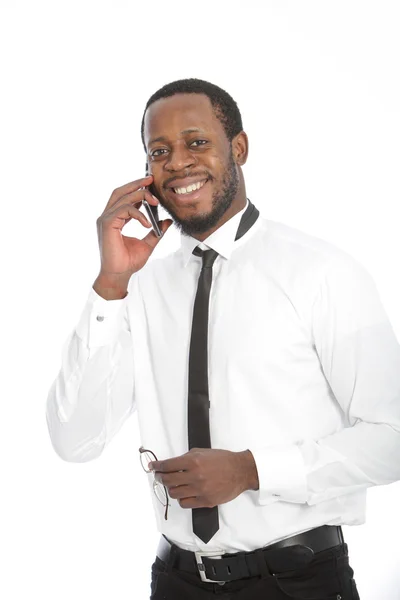 African businessman chatting on his mobile — Stock Photo, Image