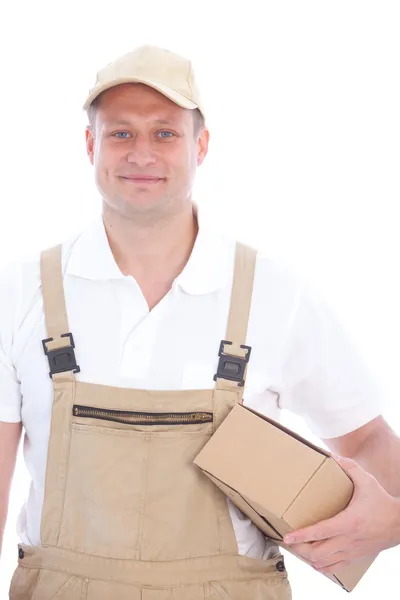 Vriendelijke levering man of workman met een pakket — Stockfoto