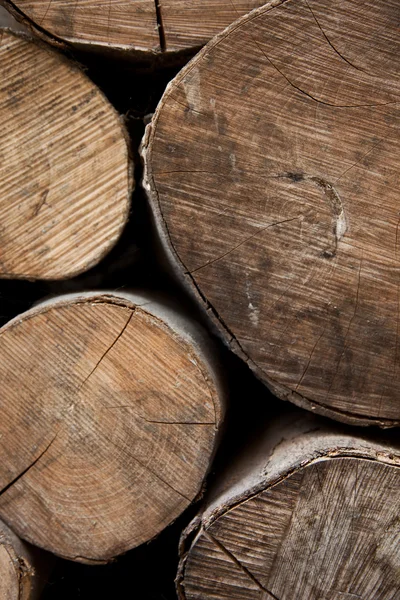 Sawn logs in a woodpile — Stock Photo, Image