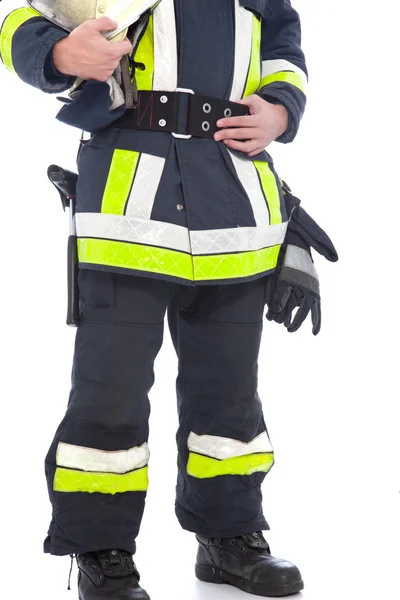 Cuerpo de un bombero mostrando su uniforme y equipo — Foto de Stock