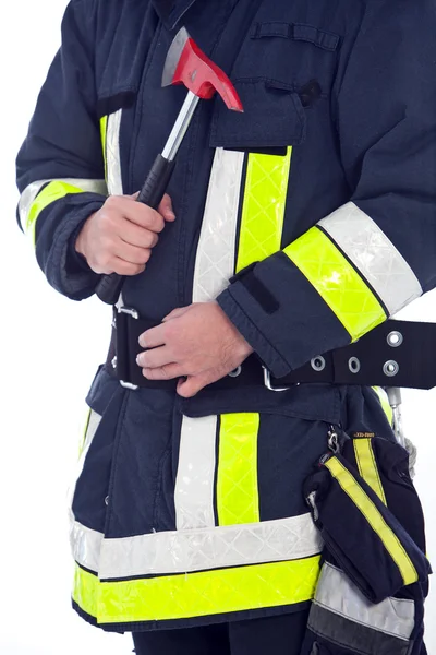 Bombero de uniforme con hacha de fuego — Foto de Stock