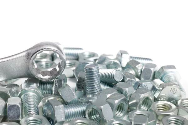Jumbled pile of bolts and nuts — Stock Photo, Image