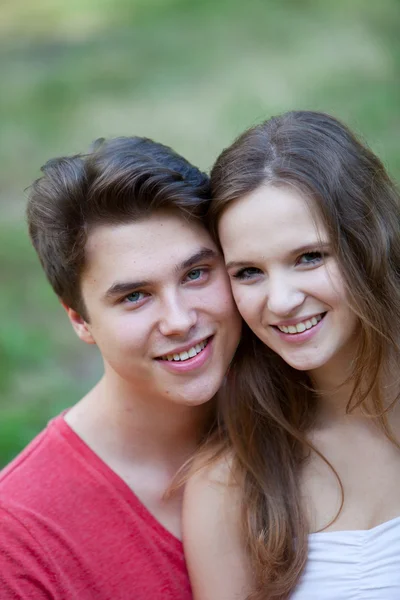 Happy laughing young teenage couple — Stock Photo, Image