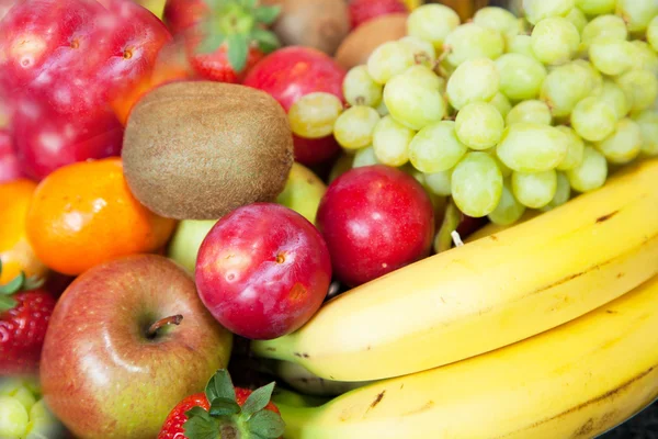 Background of colorful fresh tropical fruit — Stock Photo, Image