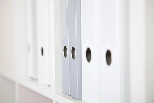 Several White and Gray Binders — Stock Photo, Image