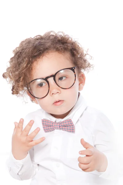 Macro lindo rizado niño usando gafas de ojo — Foto de Stock