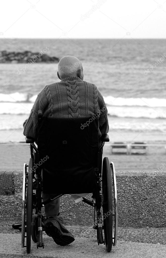 Disabled man on wheelchair.