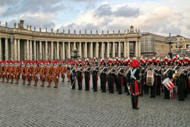 Pontifical Swiss guards and military band in Vatican. clipart