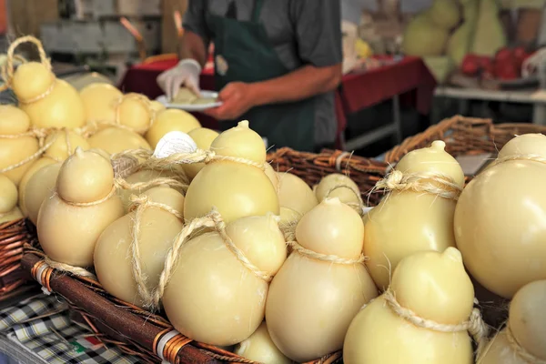 Caciocavallo cheese on the stand. — Stock Photo, Image