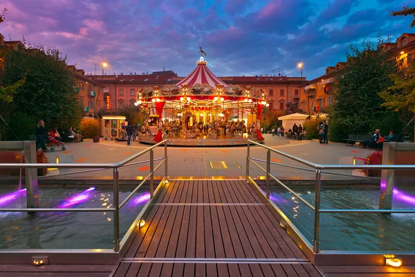 Carousel on town square in Alba, Italy. - Stock-foto