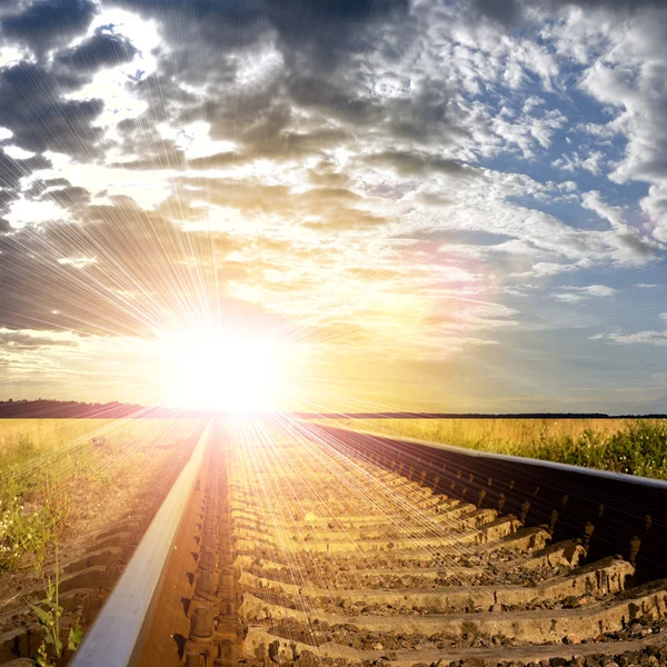 Railway into the sunset — Stock Photo, Image