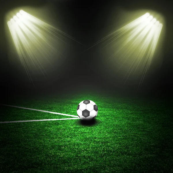 Soccer ball on the green field with lightnings — Stock Photo, Image