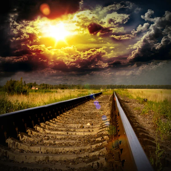 Railway into the sunset — Stock Photo, Image