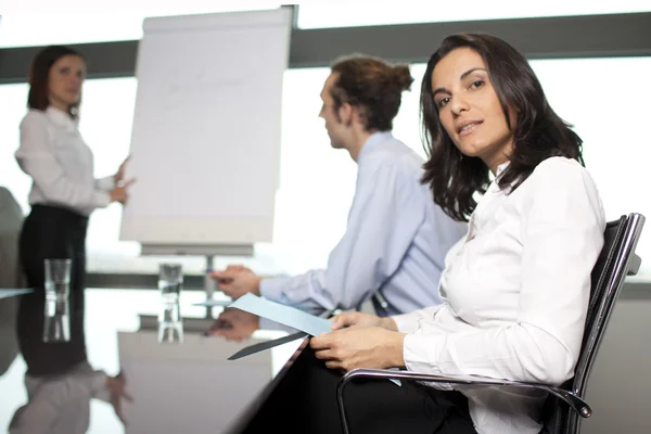 Group of office workers in a boardroom presentation — Stock Photo, Image