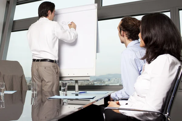 Group of office workers in a boardroom presentation — Stock Photo, Image