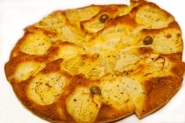 Focaccia with onions and olives from Italy clipart