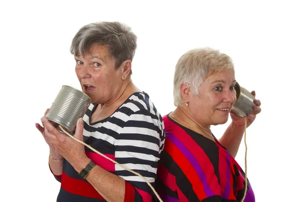 Female senior talking with can telephone — Stock Photo, Image