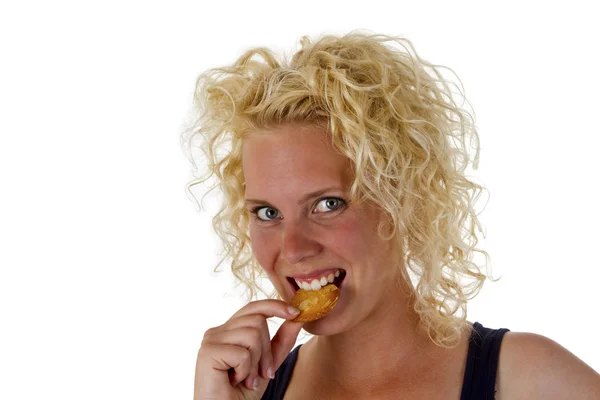 Mujer joven comiendo galleta —  Fotos de Stock
