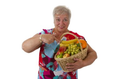 meyve sepeti tutan kadın kıdemli