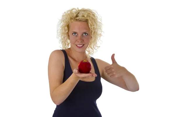 Beautiful blond woman holding red apple — Stock Photo, Image