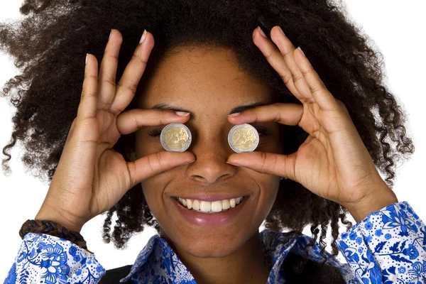 Mujer escondiendo sus ojos con monedas de euro — Foto de Stock