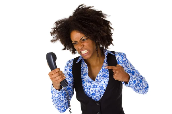 Angry african american woman with handset — Stock Photo, Image