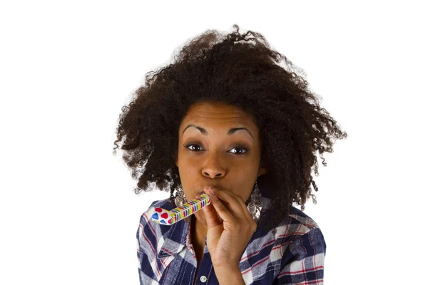 Young woman blow in Partyhorn — Stock Photo, Image