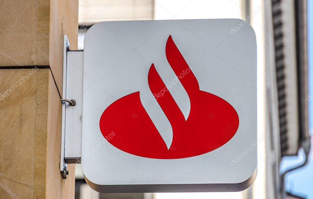 GIESSEN, GERMANY - 2021_04_09: A sign for a Santander Bank outlet in the city GIESSEN.