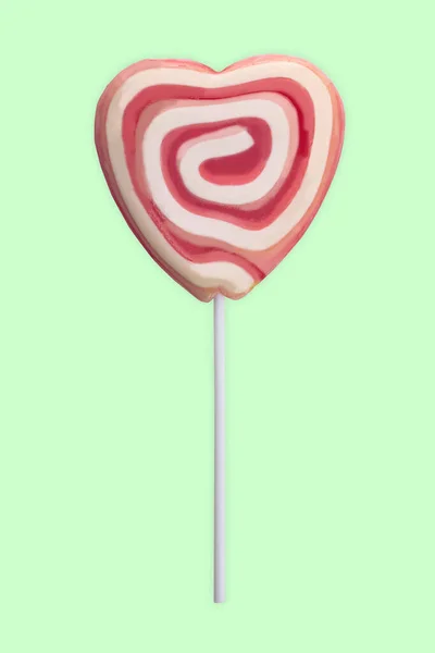 Pink Swirl Lollipop Isolated Green Background — Stock Photo, Image