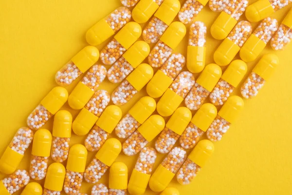 Top View Yellow Pills Yellow Background — Stock Photo, Image