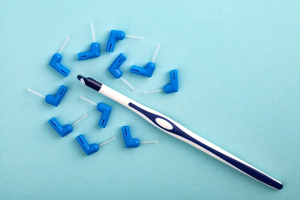 Concepto Cepillo Interdental Sobre Fondo Azul Claro —  Fotos de Stock