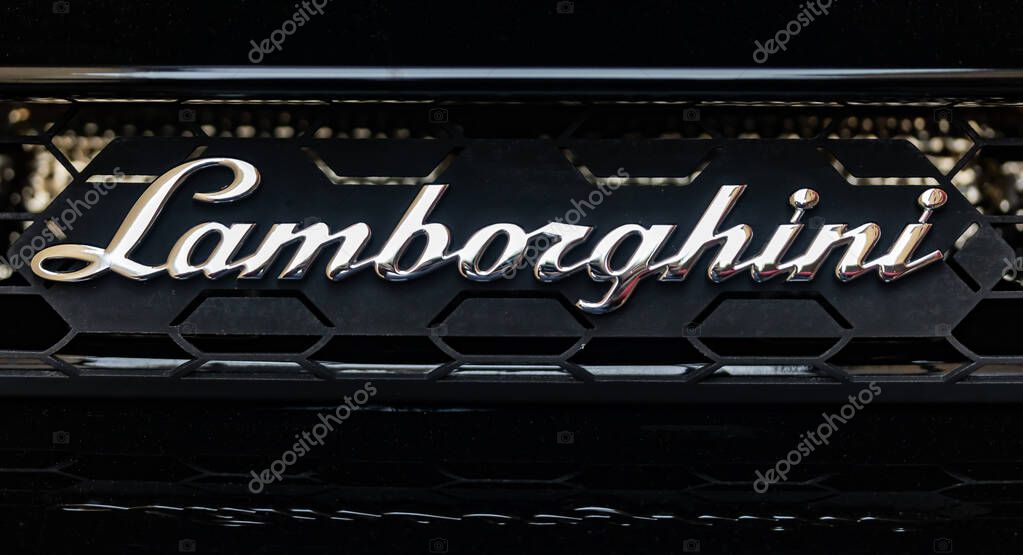 WETZLAR, GERMANY 2022-04-23: Lamborgini chrome Lettering on Lamborghini car displayed.