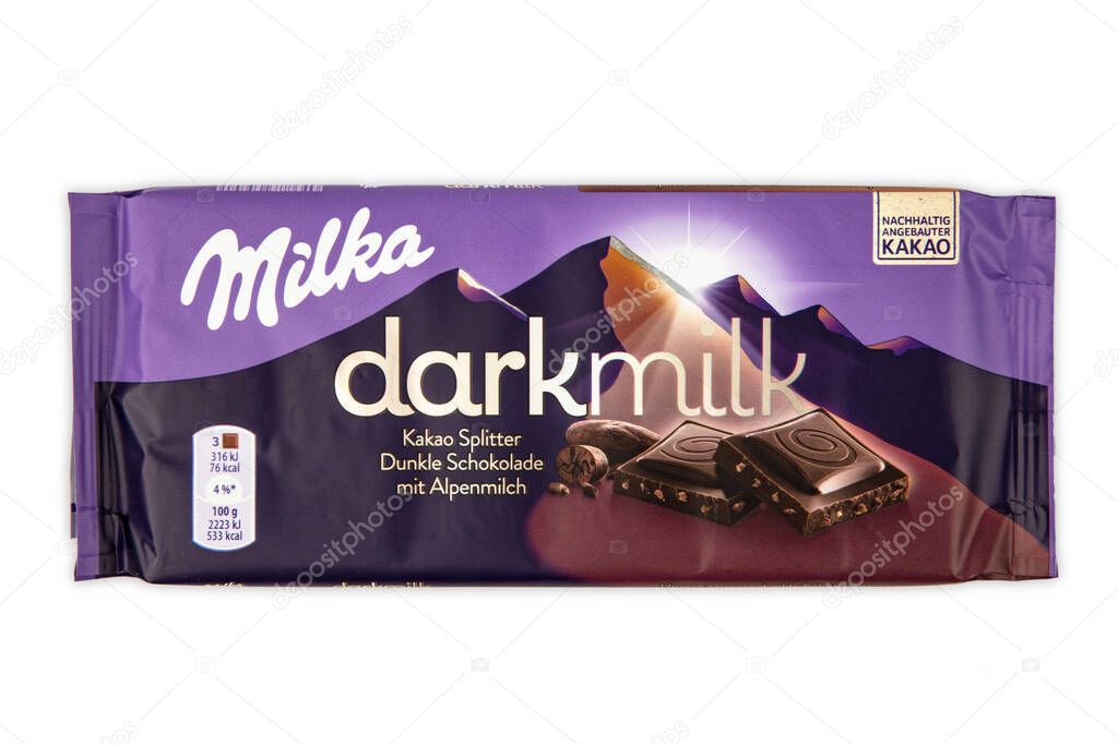 WETZLAR; GERMANY - 2022-04-11:  Milka chocolate bar on white background. Milka milk chocolate bar. Milka is a brand of chocolate confection which originated in Switzerland in 1901.
