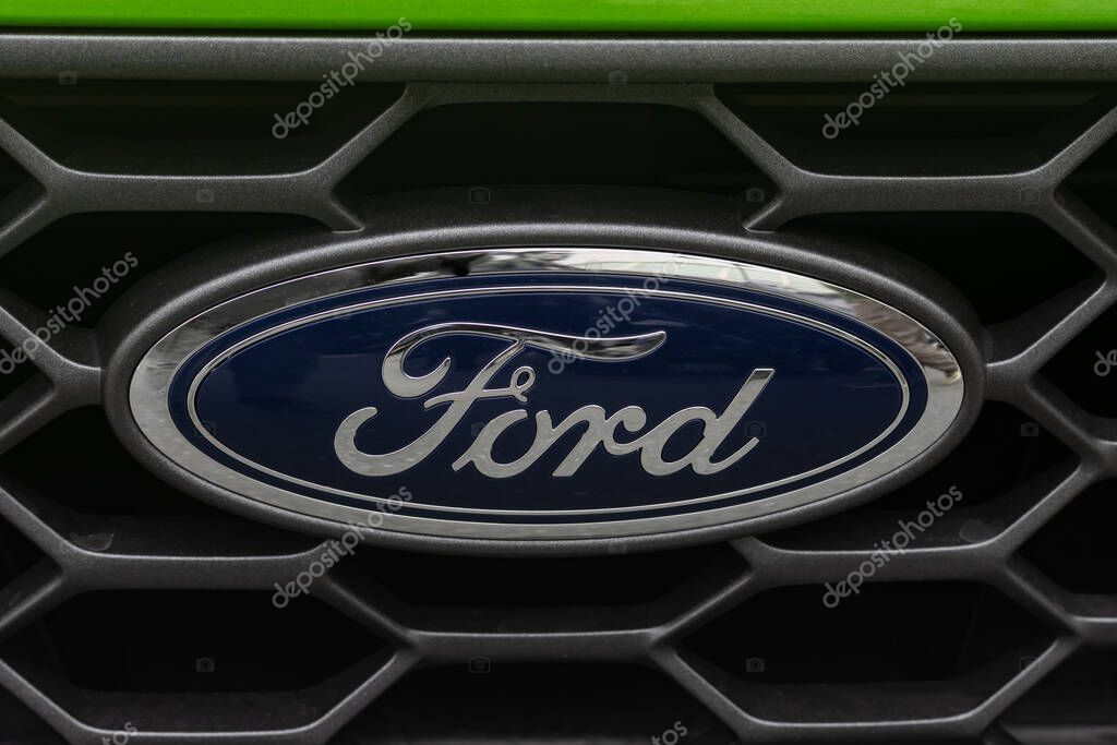 WETZLAR, GERMANY 2022-04-23: Ford logo on front of a car. Ford is an American multinational automaker that has its main headquarters in Detroit.