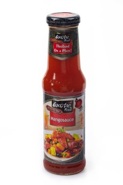 WETZLAR, GERMANY 2022-07-18: Hot Exotic Food Mango Sauce in a Bottle.  EXOTIC FOOD THAILAND is a Thai Food Wholesale Supplier.
