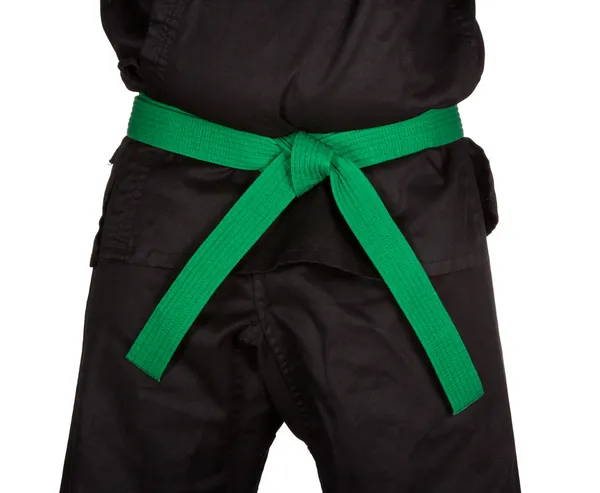 Karate verde cinturón atado alrededor torso negro uniforme —  Fotos de Stock