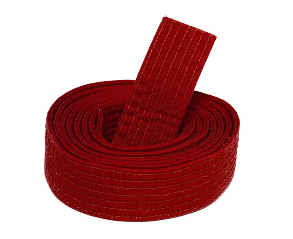 Cinturón rojo de karate enrollado —  Fotos de Stock